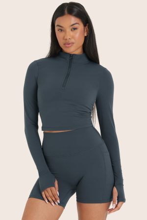 AIRLUXE BREATHE QUARTER ZIP - COMPASS